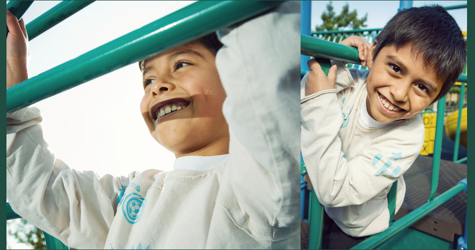little boy smiling at camera - family and child photography bucktown